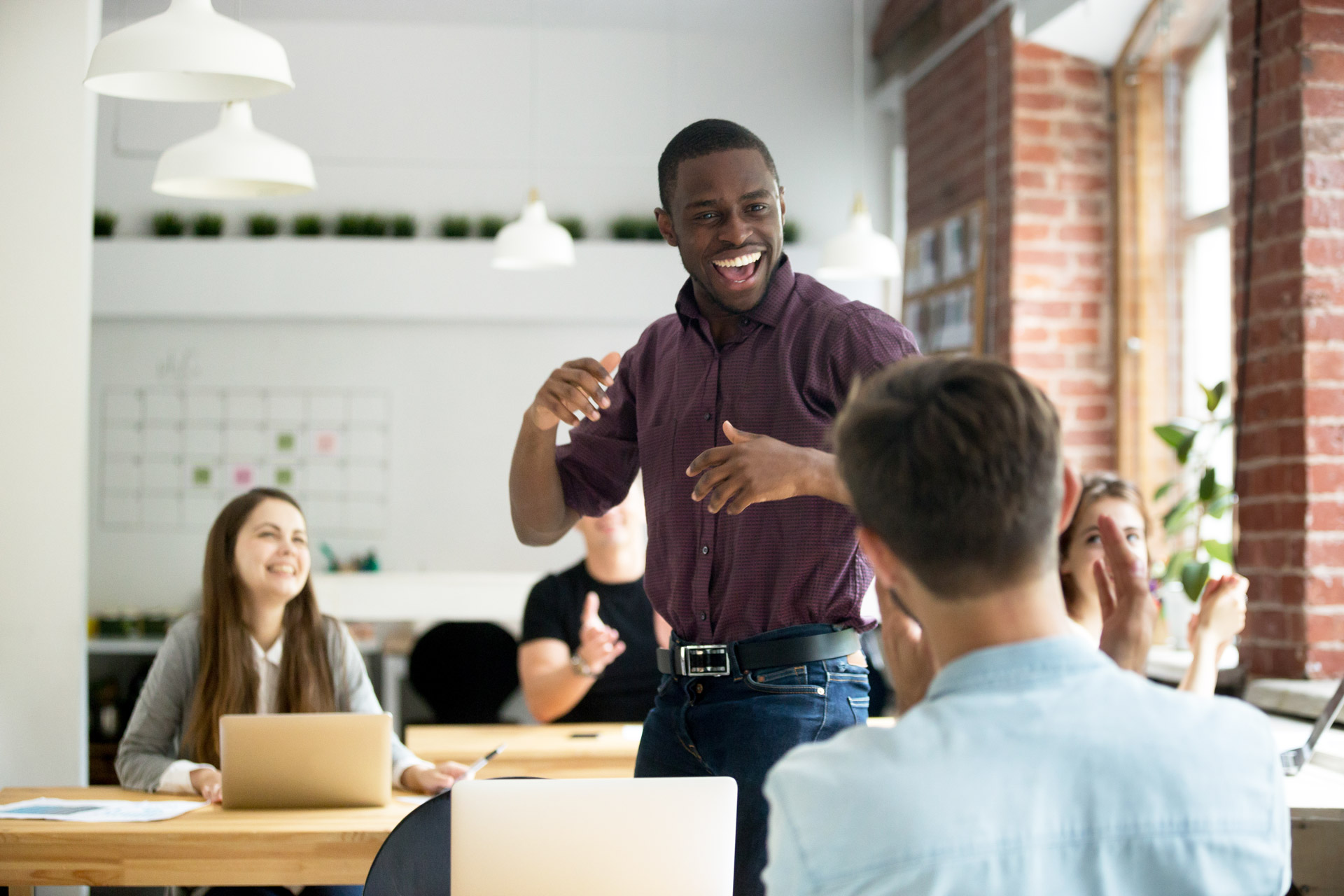 Employee Owners happily working